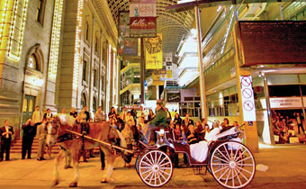 Denver performing arts complex with horse drawn carriage