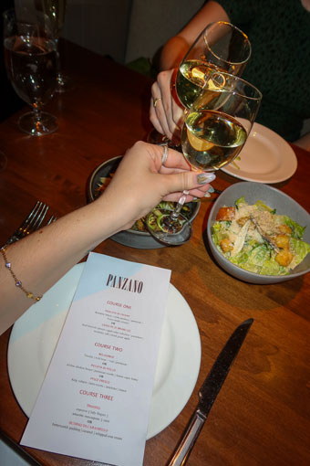 wine cheers and salad