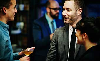 people in suits talking