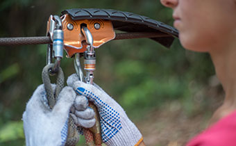 woman with zipline cable equipment